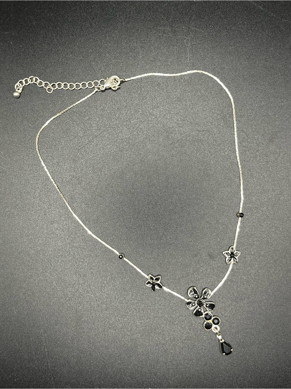 Silver Floral Pendant Necklace with Black Accents